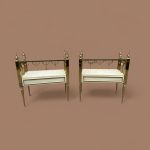 A pair of brass & glass bedside tables circa 1970’s